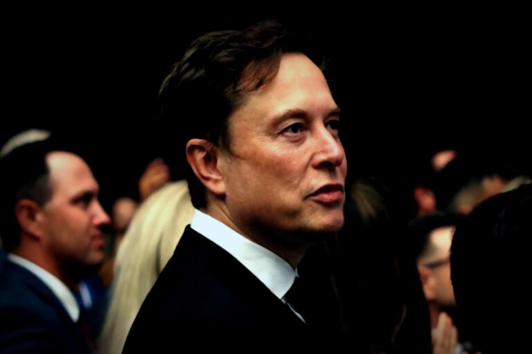 Tesla’s Profit Takes a Hit as Musk Shifts Gears to ‘Robot Army’