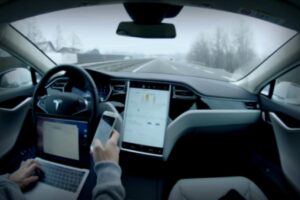 Elon Musk Hints Tesla Drivers Will Soon Be Able to ‘Text and Drive’