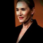 Kate Winslet’s Stylish Twist: Unbuttoned Rohe Blazer Reveals Bodysuit for Grazia