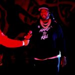 50 Cent Turns Up the Heat at OU vs Alabama Playoff Showdown